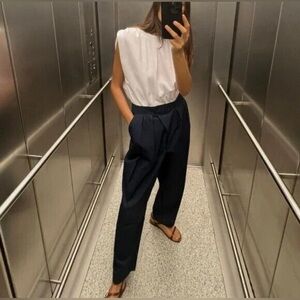 Zara White Sleeveless Top with Navy High-Waist Pleated Trousers